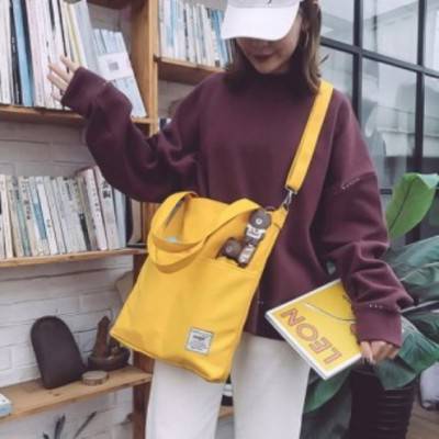 C) EL 캔버스 숄더백