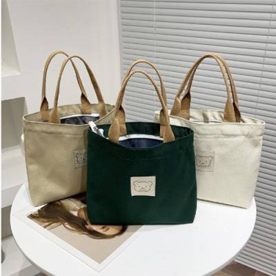 로페리아 미니멀 캔버스 내부 폴리 코팅 곰돌이 데일리 핸드백(0209489)